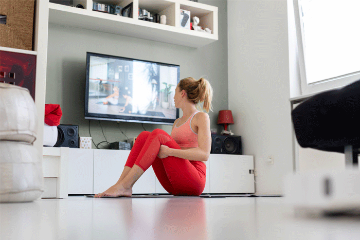 woman working out at home